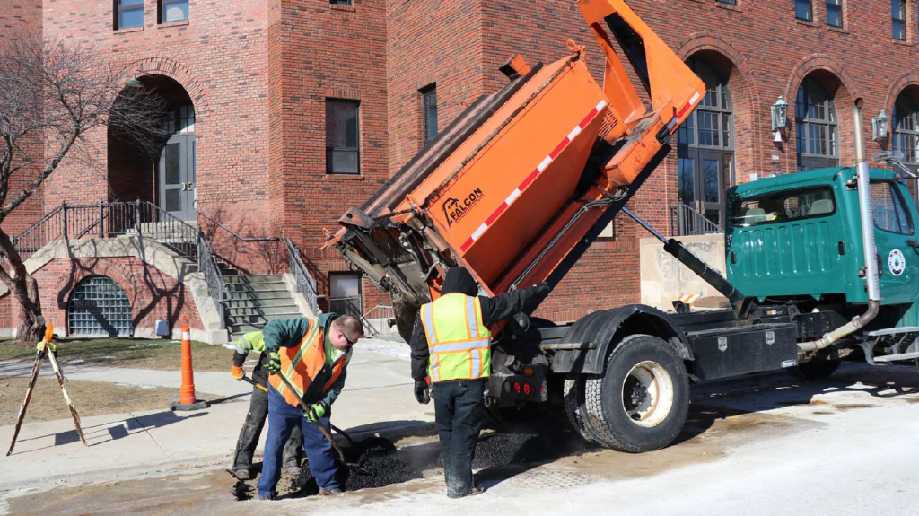 Winnetka Public Works team using a 6-ton truck-mounted hot box to repair asphalt